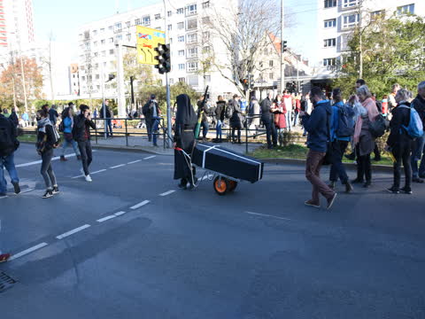 The coffin says democracy.