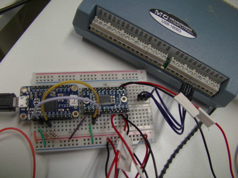 The adafruit FT232H breakout with an I2C multiplexer to connect 9dof IMU sensor. Top: MCC USB-1608G DAQ.