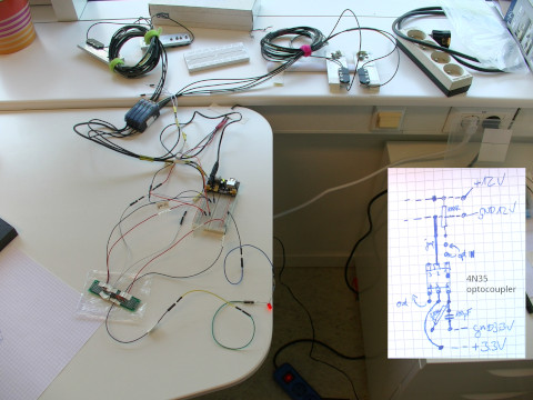 Optocoupler circuit to connect (i) a 12V circuit involving a photoelectric barrier with (ii) 3V digital readout on a tinkering computer.